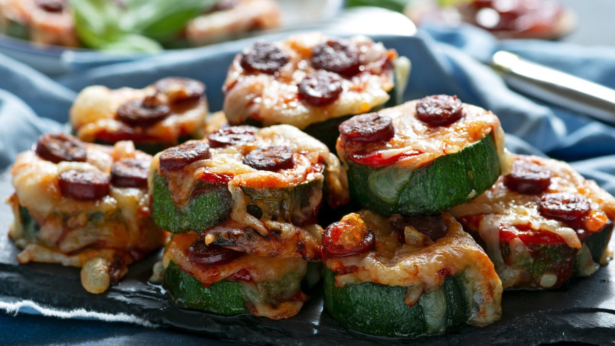 Zucchini pizza bites topped with pepperoni and cheese