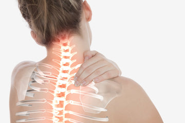 Highlighted spine of a woman with back pain