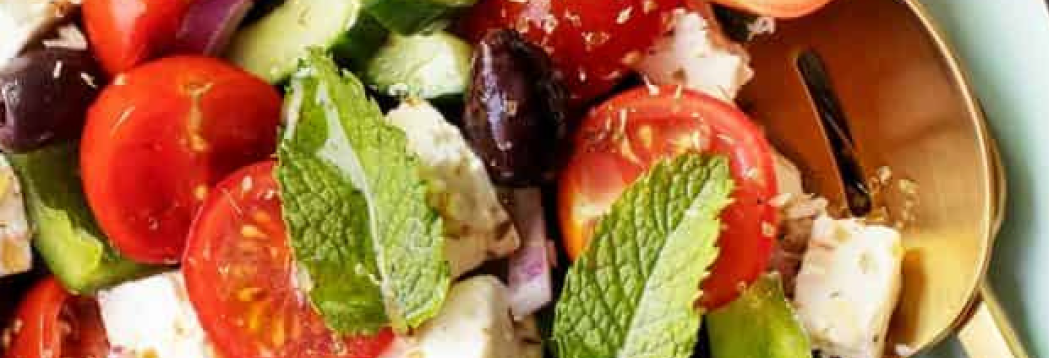 Greek salad with tomatoes, cucumber, olives and feta