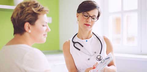 Doctor talking with a patient during a consultation