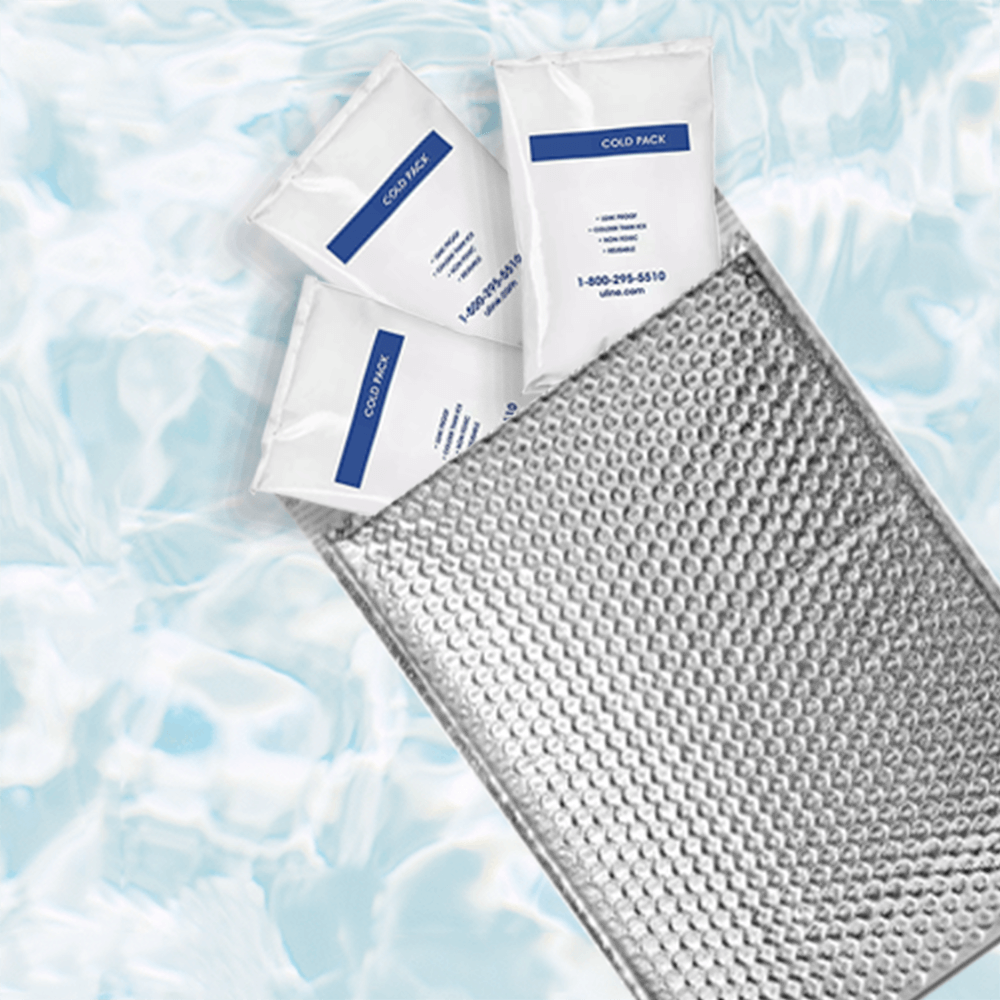 Cold packs coming out of an insulated mailing package
